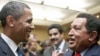 Обама дасти Чавесро мефишорад