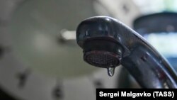SIMFEROPOL, UKRAINE - A tap in the kitchen of one of the city's apartments, 24Aug2020