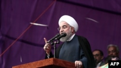 حسن روحاني.