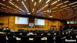 International Atomic Energy Agency (IAEA) Director General Rafael Grossi waits for the beginning of an interactive board of governors meeting in an nearly empty meeting room at the IAEA headquarters during the coronavirus disease (COVID-19) outbreak in Vi