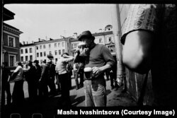 A thirsty Leningrad man downs a drink in 1974.