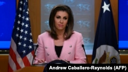 U.S. State Department spokesperson Morgan Ortagus stands at the lectern during a press conference at the U.S. Department of State in Washington, June 10, 2019