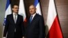 Israeli Prime Minister Benjamin Netanyahu (right) poses for pictures with Polish Prime Minister Mateusz Morawiecki during the Middle East summit in Warsaw on February 14.