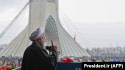Iranian President Hassan Rouhani addresses crowds during a ceremony celebrating the 40th anniversary of Islamic Revolution on Azadi (Freedom) square, in Tehran, February 11, 2019