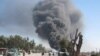 Smoke billows from the site of an explosion in Jalalabad on April 15.