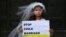 ITALY -- A young actress plays the role of Giorgia, 10, forced to marry Paolo, 47, during a happening organised by Amnesty International to denounce child marriage, on October 27, 2016 in Rome.