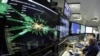 A graphic showing a collision at full power in the control room for the Large Hadron Collider (LHC) at the European Organization for Nuclear Research (CERN). In 2012, CERN announced it may have discovered the elusive Higgs boson particle. (file photo)