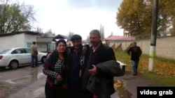 Murod Juraev (center) after his release from prison