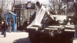 A tank with a portrait of Ayatollah Ruhollah Khomeini at the Niavaran Palace in Tehran on February 12, 1979