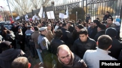 Armenia - Hundreds of people demonstrate against controversial pension reform outside the National Assembly building, Yerevan,4Dec,2013