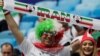 RUSSIA -- Iranian soccer fans cheer prior to the Russia 2018 World Cup Group B football match between Morocco and Iran at the St. Petersburg Stadium in St. Petersburg. June 15, 2018