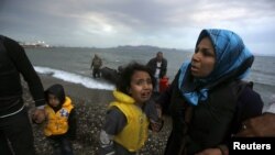 Afghan immigrants land at a beach on the Greek island of Kos after crossing on a dingy a part of the south-eastern Aegean Sea between Turkey and Greece in May.