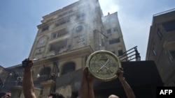 PHOTO GALLERY: Muslim Brotherhood offices burned as Egypt protests flare
