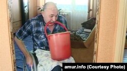 Инвалид-колясочник Юрий Вакуленко из амурского села Екатеринославка
