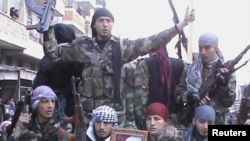 Syria -- Members of the Free Syrian Army take parti in an anti-regime demonstration in Marat al-Numan, 15Jan2012