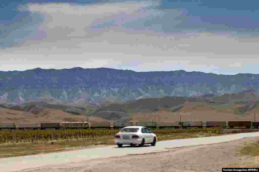 The road from Ashgabat to Dostluk. The asphalt is now riddled with potholes due to lack of maintenance; the road was in far better shape when Annagurban drove on it 15 years ago. His older sister died in a car accident on this road.