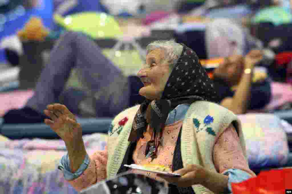 An elderly woman from the town of Obrenovac at a shelter for flood victims in Belgrade