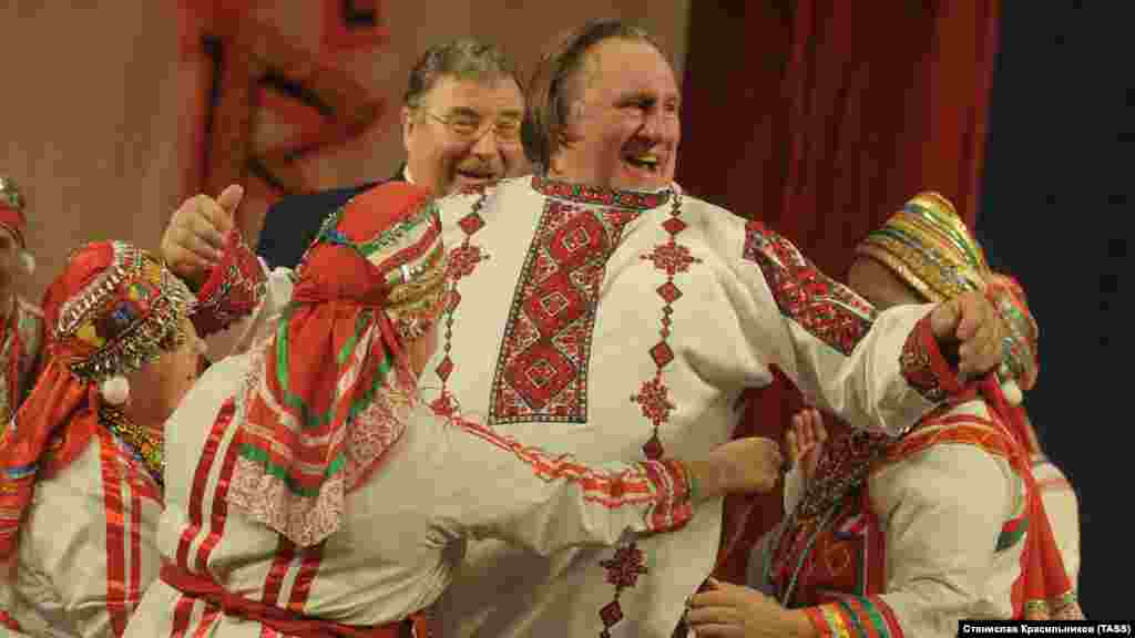 French actor Gerard Depardieu wears a local costume at a ceremony attended by Vladimir Volkov (left), the leader of the Russian republic of Mordovia, in the town of Saransk on January 6. Depardieu received Russian citizenship in February. 