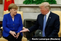 Канцлерка Німеччини Ангела Меркель та президент США Дональд Трамп на зустрічі у Вашингтоні, 27 квітня 2018 року