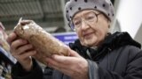 Russia - a shopper and buckwheat - TASS - screengrab