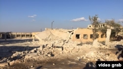 A field hospital run by the Syrian American Medical Society (SAMS) in the northwestern Syrian town of Sarmin lies in ruins after being bombed in October 2015. 