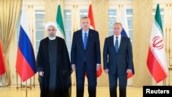 Лідери Росії, Ірану та Туреччини Володимир Путін (п), Хасан Роугані (л) та Реджеп Тайїп Ердоган (ц), Анкара, 16 вересня 2019 року 