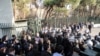 Iranian students scuffle with police at the University of Tehran during a demonstration in the capital Tehran on December 30, 2017. 