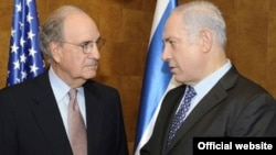 U.S. envoy to the Middle East George Mitchell (left) with Israeli Prime Minister Binyamin Netanyahu on September 29.