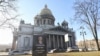 Russian Police Detain Activists For Hanging Putin Photo At Cemetery