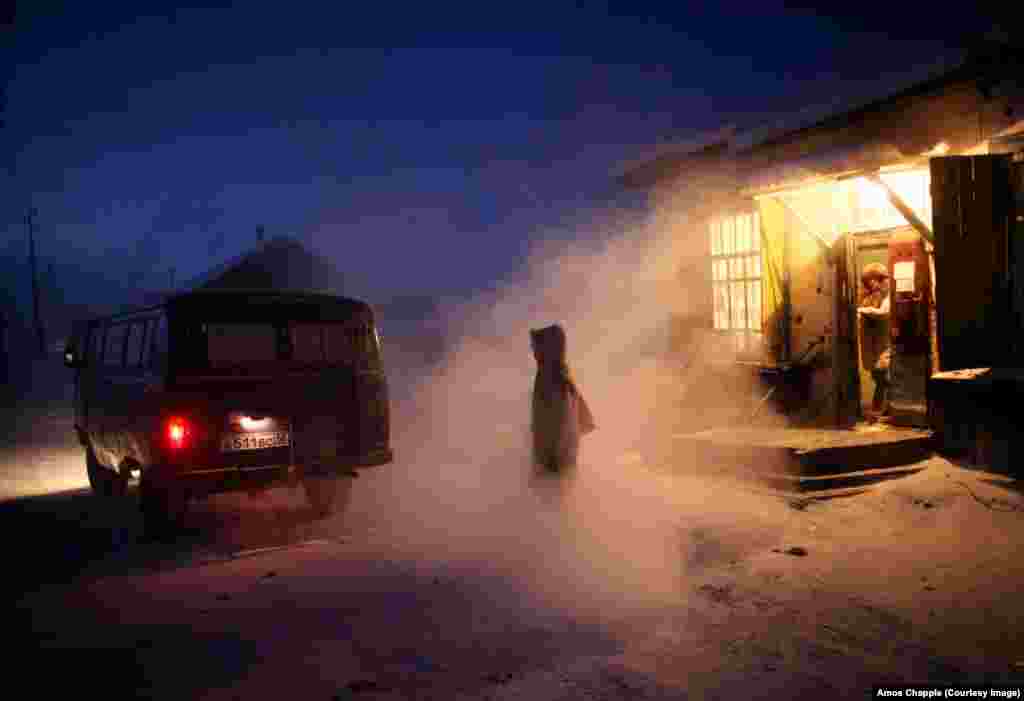 Locals emerge from the village&#39;s only store. Chapple says the store was decorated with children&#39;s drawings illustrating the evils of alcohol: &quot;It was clearly an attempt by the local school to shame Oymyakon&#39;s dads into drinking less.&quot;