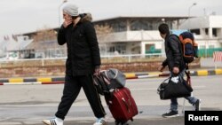 Afghans whose asylum applications were rejected arrive from Germany at Kabul airport on March 28.