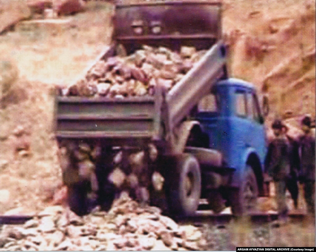 Chunks of broken khachkars being dumped during the 2005 demolition.