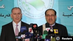 رئيس الوزراء نوري المالكي ورئيس مجلس النواب أسامة النجيفي في لقاء سابق