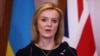 Then-British Foreign Secretary Liz Truss speaks during a joint news conference with her Ukrainian counterpart at the British Embassy in Warsaw on April 4.