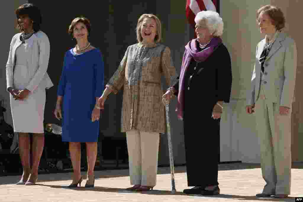U.S. first lady Michelle Obama (left) and former first ladies Laura Bush, Hillary Clinton, Barbara Bush, and Rosalynn Carter attend the opening ceremony of the George W. Bush Presidential Center in Dallas, Texas. (AFP/Alex Wong/Getty Images)