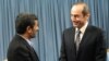 Iran -- President Mahmud Ahmadinejad (L) meets with former Armenian President Robert Kocharian in Tehran, 21Jan2010