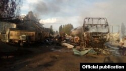 У места взрыва на газозаправочной станции в селе Ананьево Иссык-Кульской области Кыргызстана. 19 июня 2017 года.