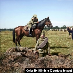 A Russian soldier stands in a hole blasted by a shell during World War I. Shirnina says she loves bringing such moments from Russian history to a wider audience and reminding people that "the world has always been full of color, even in war."