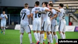 Игроки «Зари» в ходе поединка Премьер-лиги Украины