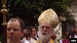 Archbishop of Canterbury Rowan Williams is trying to keep the church intact