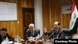 المالكي خلال إجتماعه مع كوادر وزارة الكهرباء