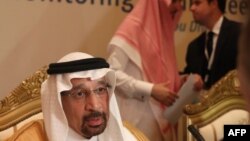 Saudi Energy Minister Khalid al-Falih listens to journalists questions during a meeting of the Joint Ministerial Monitoring Committee in the Emirati capital Abu Dhabi on November 11, 2018. - Saudi Arabia said it will trim oil exports by 500,000 barrels pe