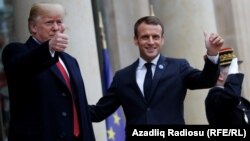 U.S. President Donald Trump and French President Emmanuel Macron meet at the Elysee presidential palace on November 11.