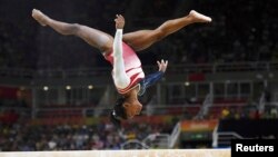 American gymnast Simone Biles faltered on the balance beam and failed to win an expected fourth gold medal at the Rio Olympics.