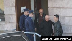 Armenia -- Hovannes Tamamian, former head of the Directorate General of Criminal Investigations at the Armenian police is placed under arrest, Yerevan, 24Mar2011. (Photo courtesy of Gagik Shamshian)