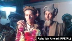 Afghan soldier abducted by the Taliban reunited with his father.