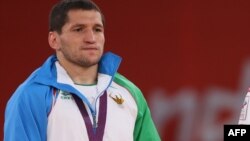 O‘zbekistonlik kurashchi Soslan Tigiev London olimpiadasida.