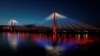 RUSSIA -- A general view shows the Vinogradovsky pedestrian bridge across the Yenisei River illuminated on the occasion of the National Flag Day in central Krasnoyarsk, Russia August 22, 2019. 