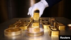 Shufra dhe monedha të arit të ruajtura në një kasafortë në Mynih të Gjermanisë. Fotografi nga arkivi.
