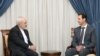 Syria's President Bashar al-Assad (R) meets with Iranian Foreign Minister Mohammad Javad Zarif in Damascus, Syria, in this handout photograph released by Syria's national news agency SANA on August 12, 2015. 